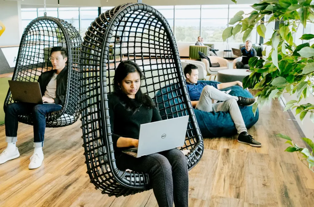 Waterman Team Membership Caribbean Park Coworking Area With Hanging Chairs