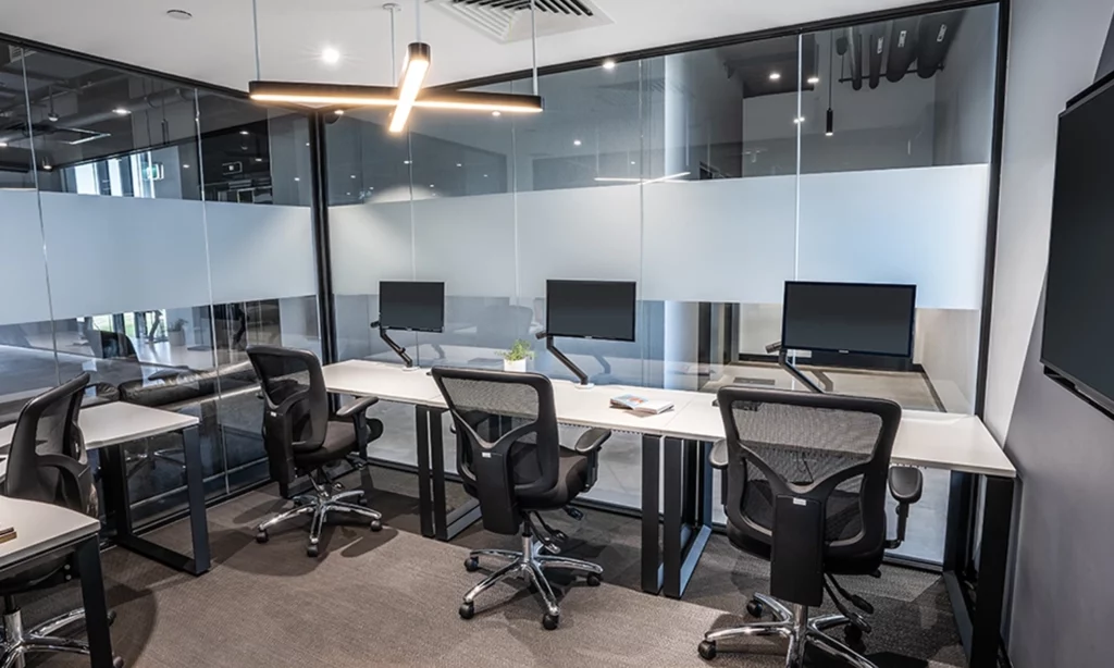 Hire a 4 Person Private Day Office for Hybrid Teams with HDMI Monitors Included at Waterman Waterman Caribbean Park Coworking Space in Scoresby, VIC